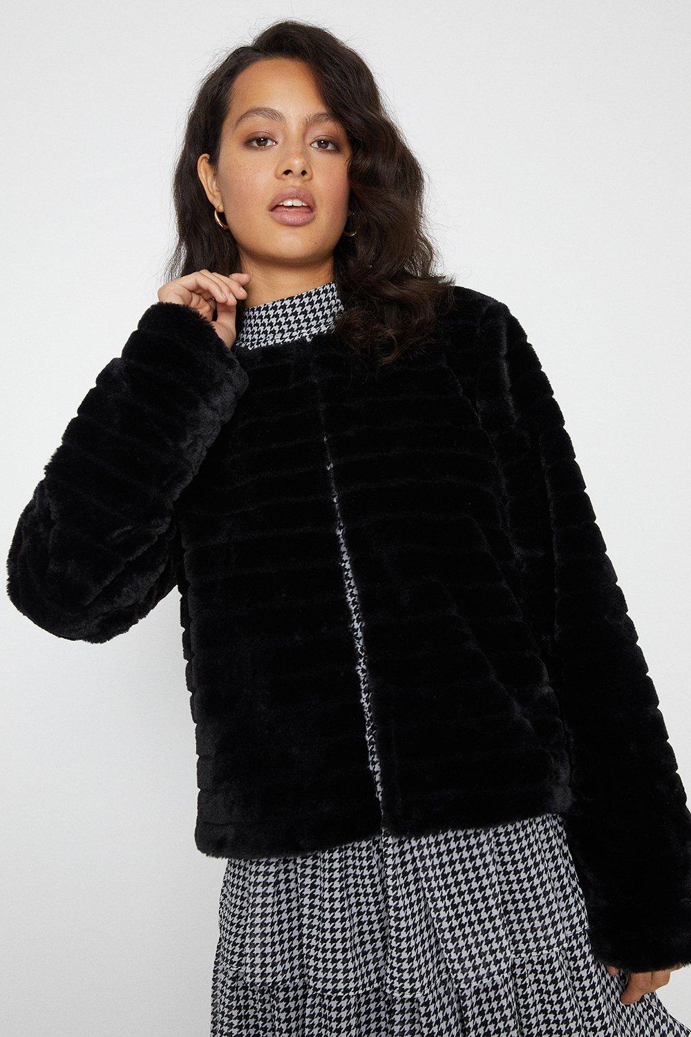 black collarless fur jacket