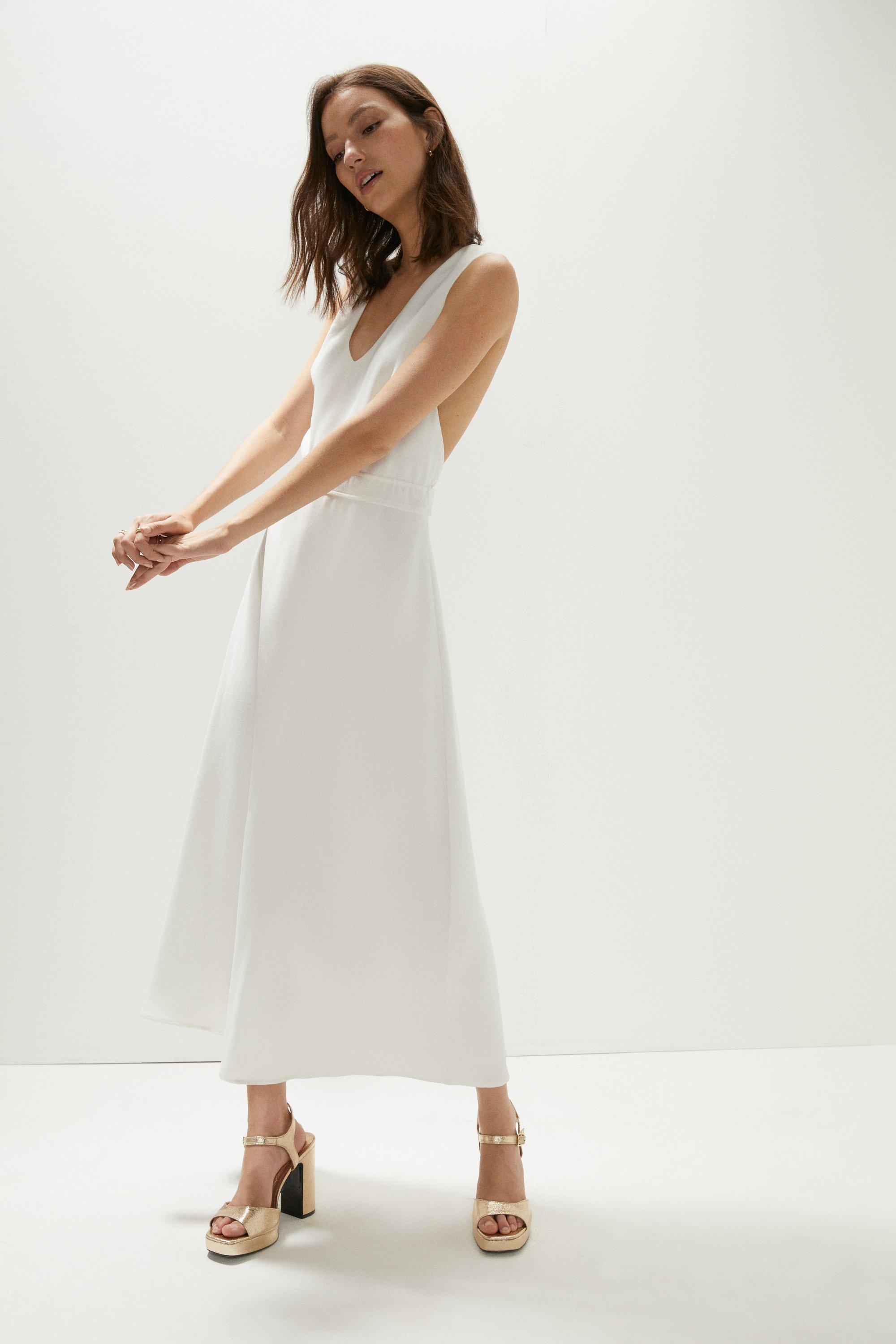 white v neck sleeveless dress